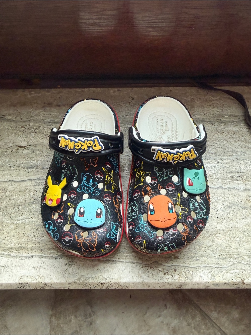 CROCS Black Kids' Pokémon Character Clogs with Yellow Blue Orange Green Accents